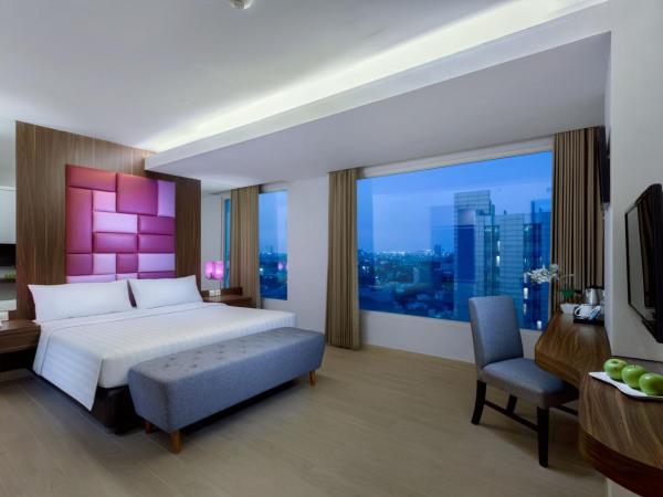 Quest Hotel Darmo - Surabaya by ASTON : photo 6 de la chambre chambre deluxe double ou lits jumeaux