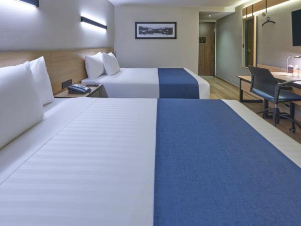 City Express by Marriott Cancun Aeropuerto : photo 1 de la chambre chambre double avec 2 lits doubles