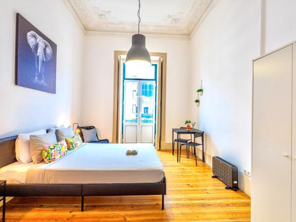 Ambiente Hostel : photo 7 de la chambre chambre lit queen-size avec salle de bains commune