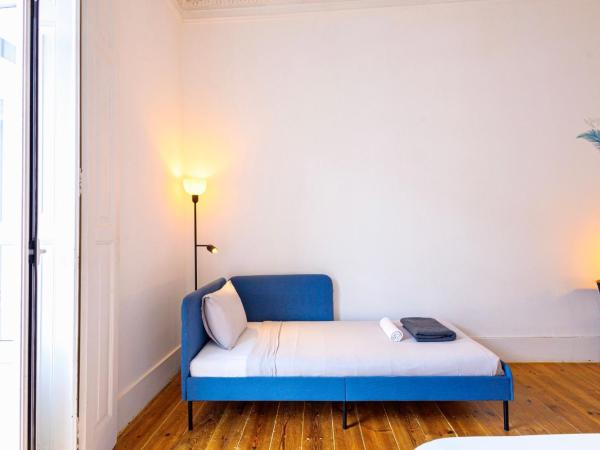 Ambiente Hostel : photo 8 de la chambre chambre triple avec salle de bains commune