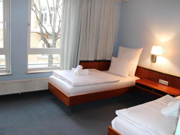 Hotel Mozart Bonn : photo 3 de la chambre chambre double ou lits jumeaux avec salle de bains privative