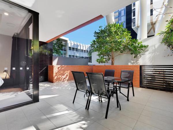 Arena Apartments by CLLIX : photo 2 de la chambre appartement 1 chambre avec cour