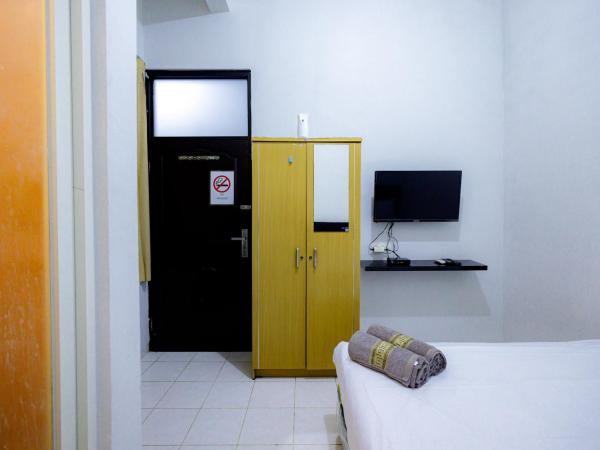 Marcello Residence Siwalankerto near Petra University Surabaya Mitra RedDoorz : photo 10 de la chambre chambre double standard