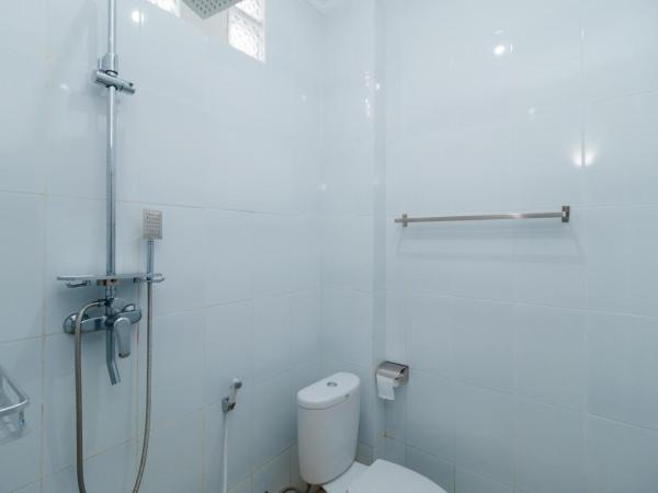 Urbanview keTemon Hotel & Resto YIA by RedDoorz : photo 2 de la chambre chambre lits jumeaux