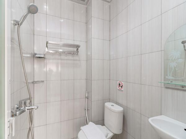 Urbanview keTemon Hotel & Resto YIA by RedDoorz : photo 4 de la chambre chambre lits jumeaux