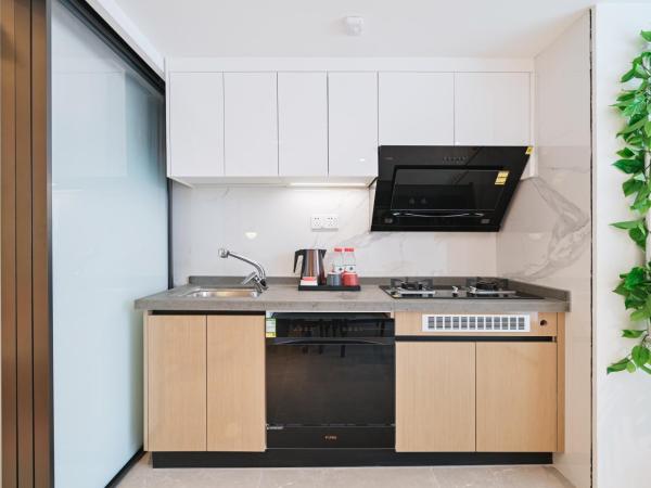 Livetour Hotel HaiZhu Hopson New Plaza Guangzhou : photo 9 de la chambre chambre lit queen-size