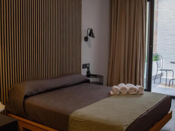 Welldone Antiquarium : photo 4 de la chambre chambre double avec jardin