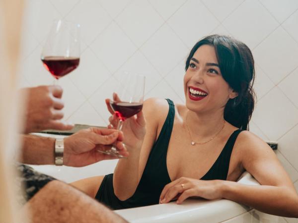 Residenza Kastrum : photo 1 de la chambre suite deluxe avec baignoire spa