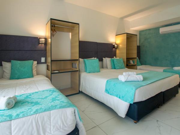 Pousada Aroma do Mar by Latitud Hoteles : photo 1 de la chambre chambre quadruple de luxe