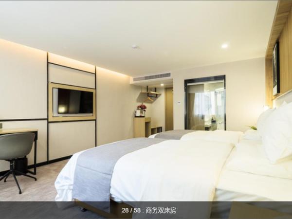 The Best Time Hotel Pazhou-Free shuttle bus for canton fair : photo 3 de la chambre chambre lits jumeaux deluxe