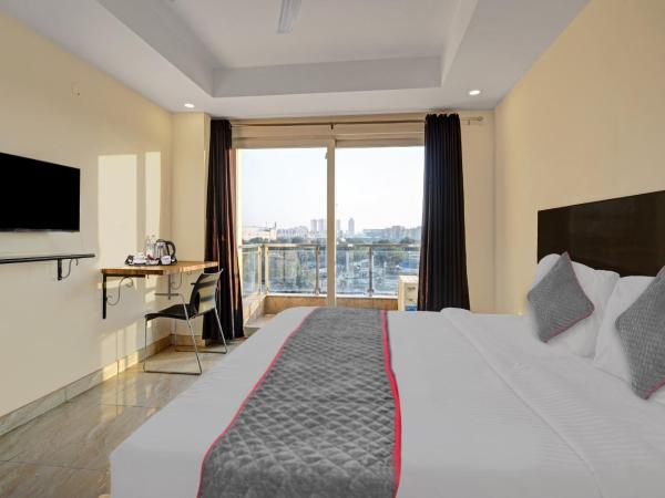 Townhouse Tipsyy Near Bestech Central Square Mall : photo 5 de la chambre chambre triple classique