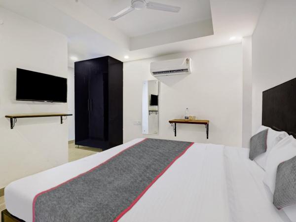 Townhouse Tipsyy Near Bestech Central Square Mall : photo 1 de la chambre chambre triple classique