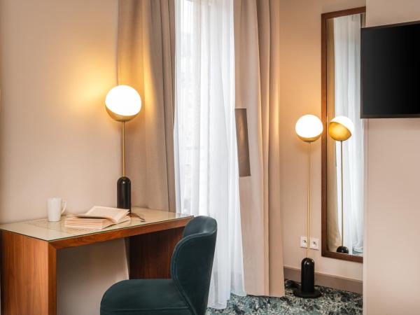 Hôtel Le Tourville by Inwood Hotels : photo 6 de la chambre chambre double ou lits jumeaux exécutive