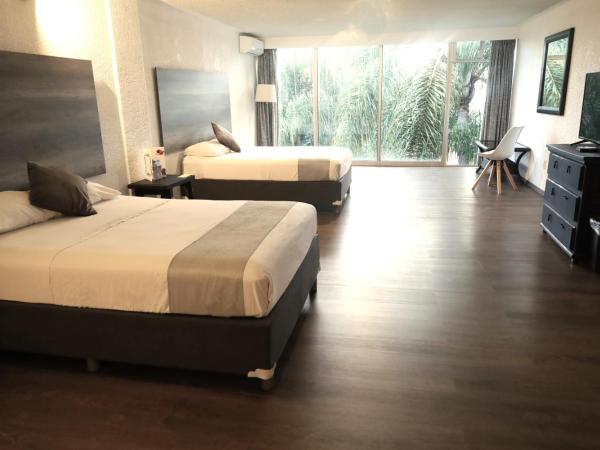 Hotel Grand Vista Cuernavaca : photo 5 de la chambre chambre double - vue sur jardin