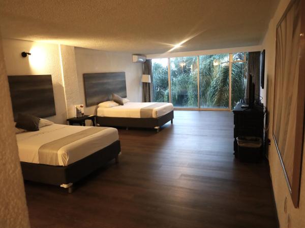 Hotel Grand Vista Cuernavaca : photo 7 de la chambre chambre double - vue sur jardin