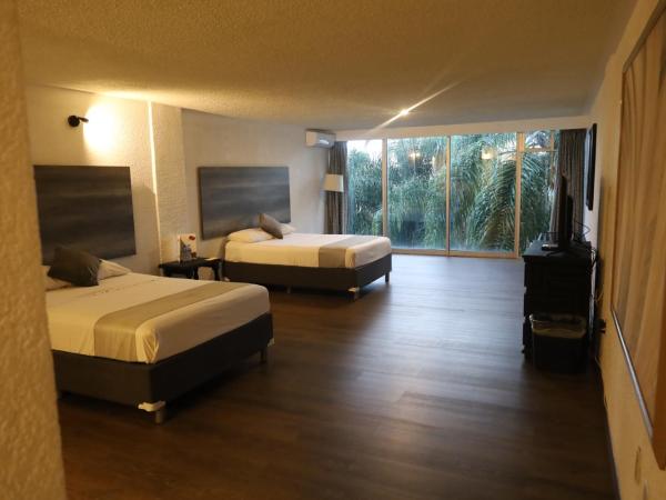 Hotel Grand Vista Cuernavaca : photo 9 de la chambre chambre double - vue sur jardin