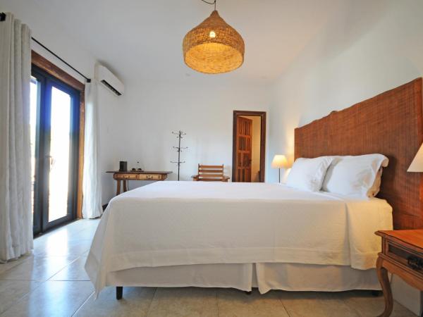 Villa Santa Fé : photo 1 de la chambre chambre avec balcon