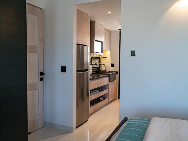 Flamboyan Hotel & Residences : photo 2 de la chambre chambre deluxe