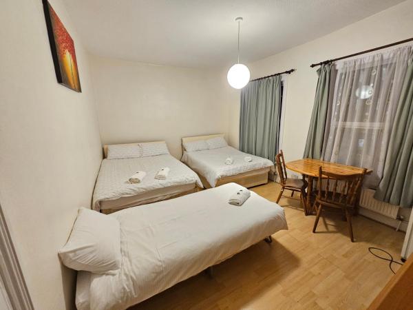 Bruce Rooms : photo 9 de la chambre chambre quadruple