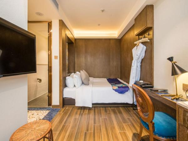 Overseas Chinese Town Nanyang Inn : photo 1 de la chambre chambre simple standard
