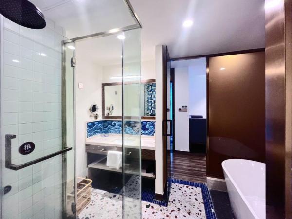 Overseas Chinese Town Nanyang Inn : photo 3 de la chambre chambre lit king-size exécutive