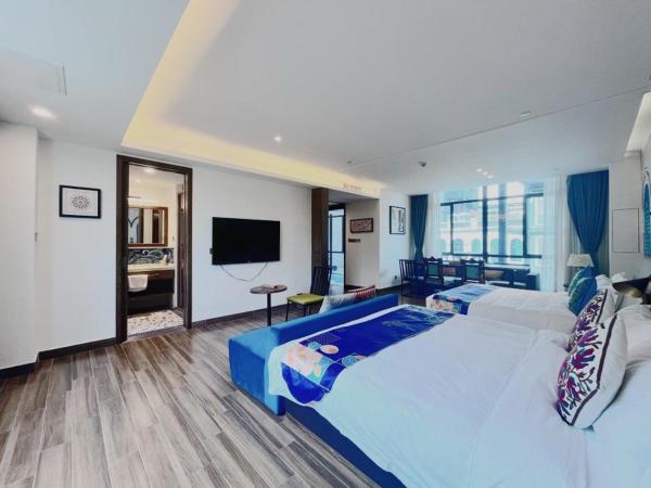 Overseas Chinese Town Nanyang Inn : photo 1 de la chambre chambre lits jumeaux exécutive