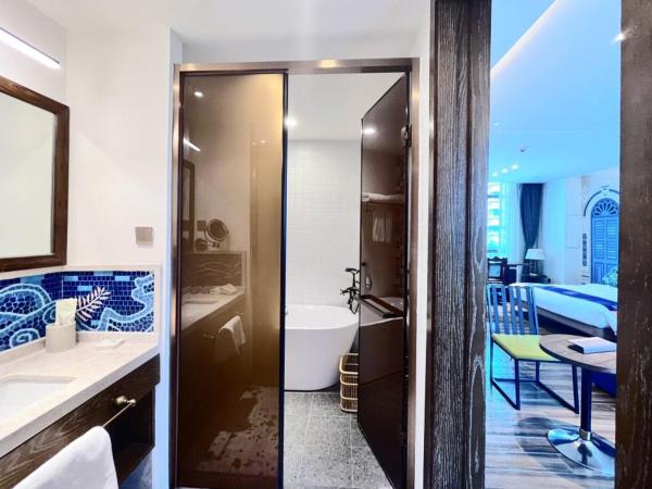 Overseas Chinese Town Nanyang Inn : photo 3 de la chambre chambre lits jumeaux exécutive