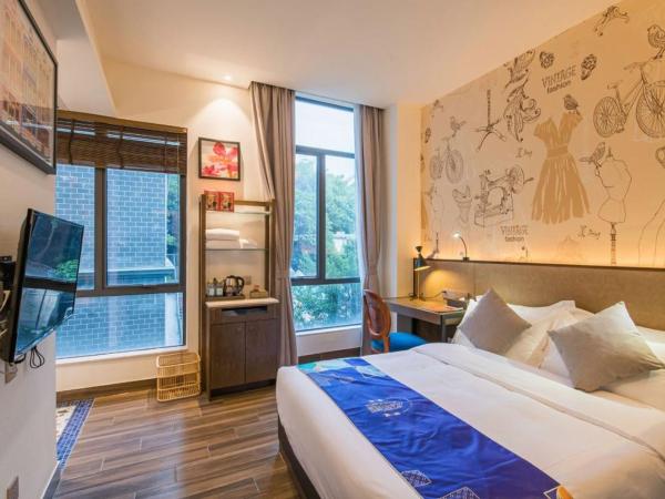 Overseas Chinese Town Nanyang Inn : photo 2 de la chambre chambre supérieure lit queen-size