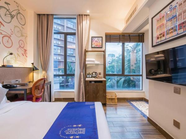 Overseas Chinese Town Nanyang Inn : photo 4 de la chambre chambre supérieure lit queen-size