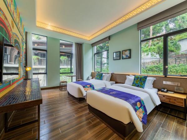 Overseas Chinese Town Nanyang Inn : photo 2 de la chambre chambre lits jumeaux supérieure