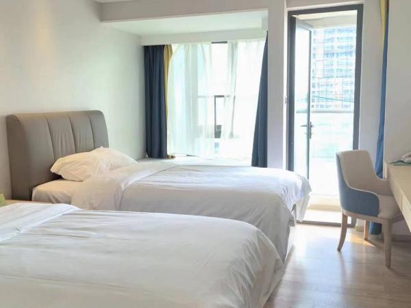Fuan Hotel - Shenzhen International Convention and Exhibition Center Branch : photo 7 de la chambre chambre lits jumeaux deluxe