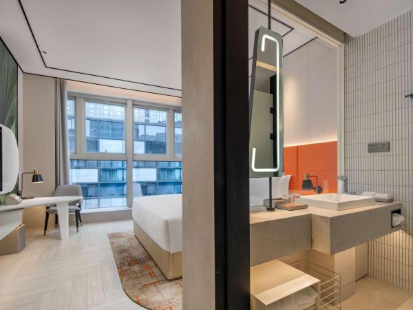 Hilton Garden Inn Nanjing Hexi Olympic Sports Center : photo 3 de la chambre chambre lit king-size