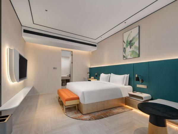 Hilton Garden Inn Nanjing Hexi Olympic Sports Center : photo 2 de la chambre suite deluxe avec lit king-size