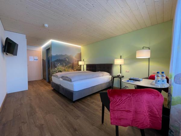 Ferien- und Familienhotel Alpina Adelboden : photo 4 de la chambre chambre double deluxe avec balcon