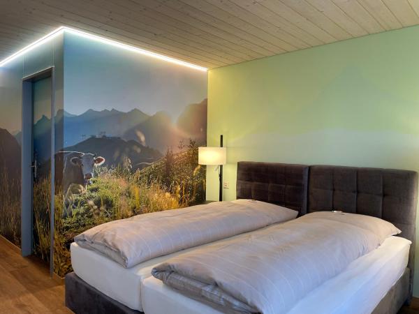 Ferien- und Familienhotel Alpina Adelboden : photo 5 de la chambre chambre double deluxe avec balcon