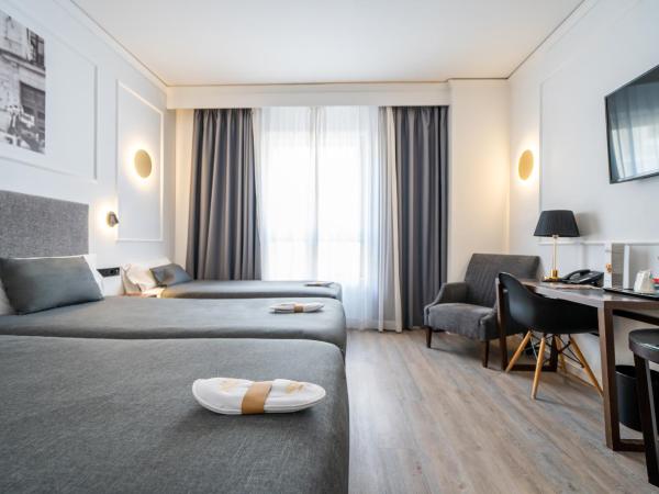 Hotel Conqueridor : photo 7 de la chambre chambre triple