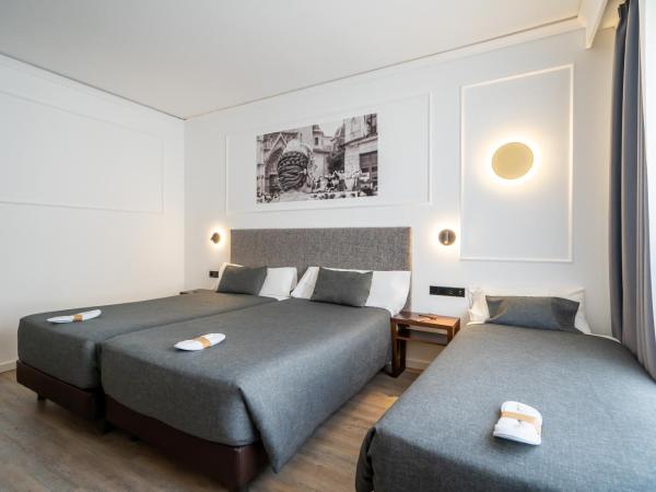 Hotel Conqueridor : photo 3 de la chambre chambre triple