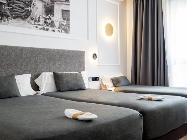 Hotel Conqueridor : photo 4 de la chambre chambre triple