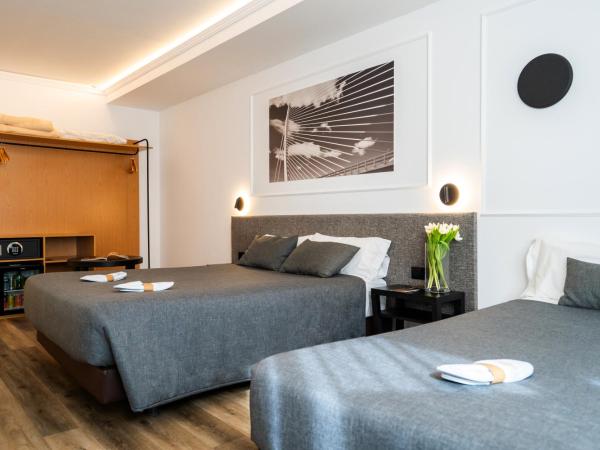 Hotel Conqueridor : photo 8 de la chambre chambre triple