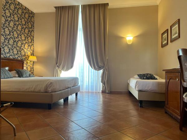 Hotel Nuvò : photo 1 de la chambre chambre triple