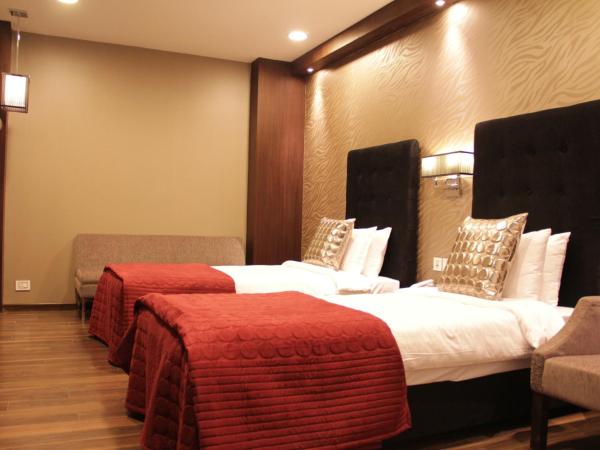 The Nanee Suites : photo 1 de la chambre chambre double ou lits jumeaux premium