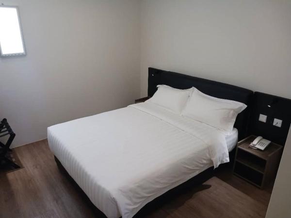 Soho Tabuan Kuching : photo 1 de la chambre chambre lit queen-size
