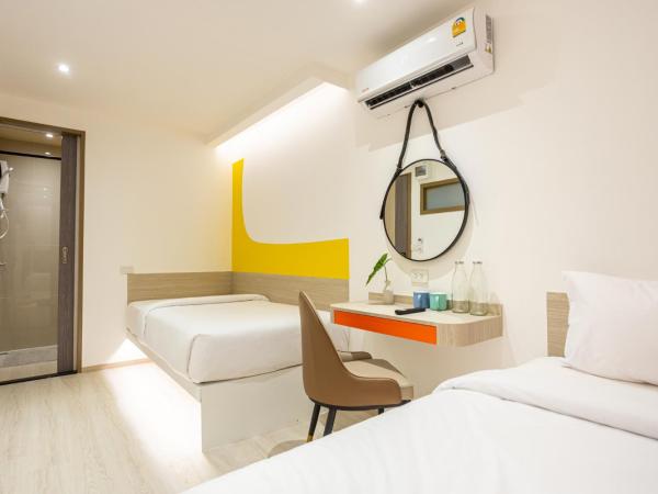 L MINITEL at Night Bazaar Chiangmai : photo 1 de la chambre chambre lits jumeaux Économique