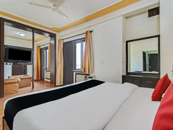 Super Capital O Tipsyy 006 Near Aravali Biodiversity Park : photo 4 de la chambre chambre triple classique