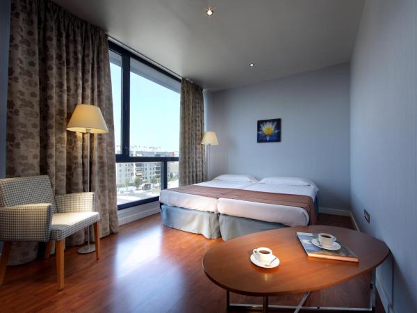 Exe Sevilla Palmera : photo 4 de la chambre chambre quadruple