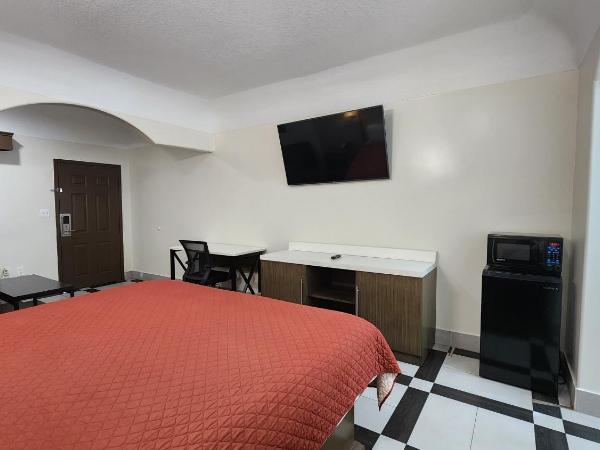 Scottish Inn & Suites Sam Houston Parkway : photo 1 de la chambre chambre double deluxe