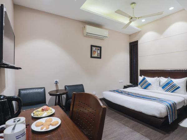 Cosy Grand, Near Chanakyapuri, Embassy Area : photo 1 de la chambre chambre double ou lits jumeaux supérieure