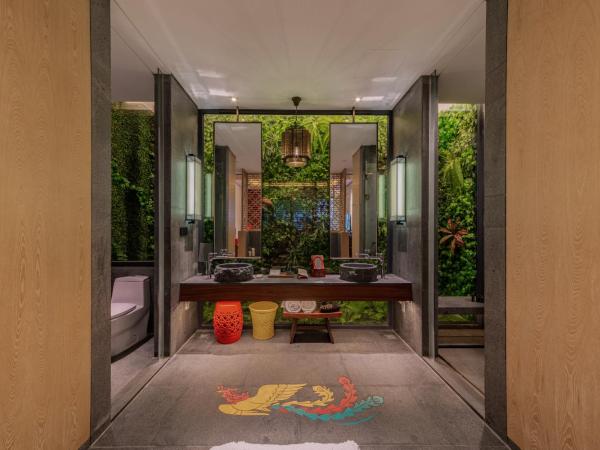 Shenzhen OCT Gankeng Ancient Town Phoenix Hakka Hotel : photo 6 de la chambre chambre lit queen-size deluxe