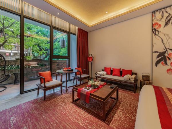 Shenzhen OCT Gankeng Ancient Town Phoenix Hakka Hotel : photo 3 de la chambre chambre lit queen-size deluxe