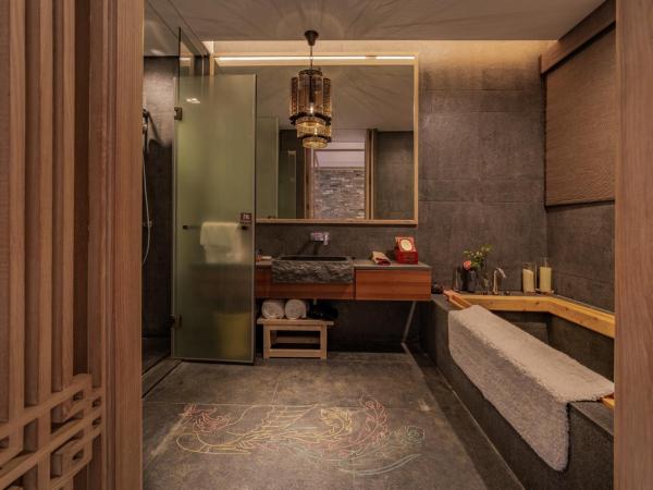 Shenzhen OCT Gankeng Ancient Town Phoenix Hakka Hotel : photo 7 de la chambre chambre lit queen-size deluxe